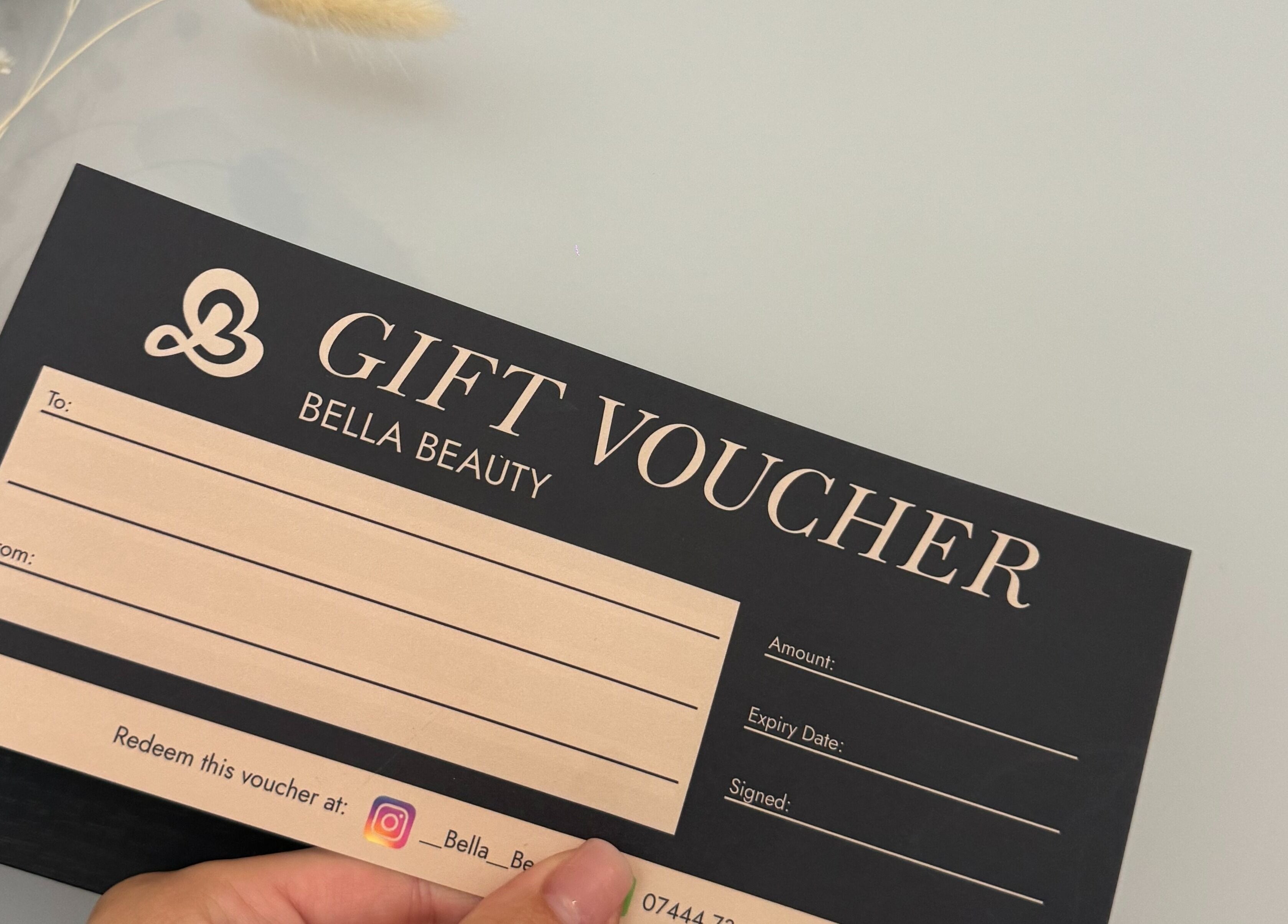 Bella Beauty gift voucher on display in Bowerhill, England, GB.