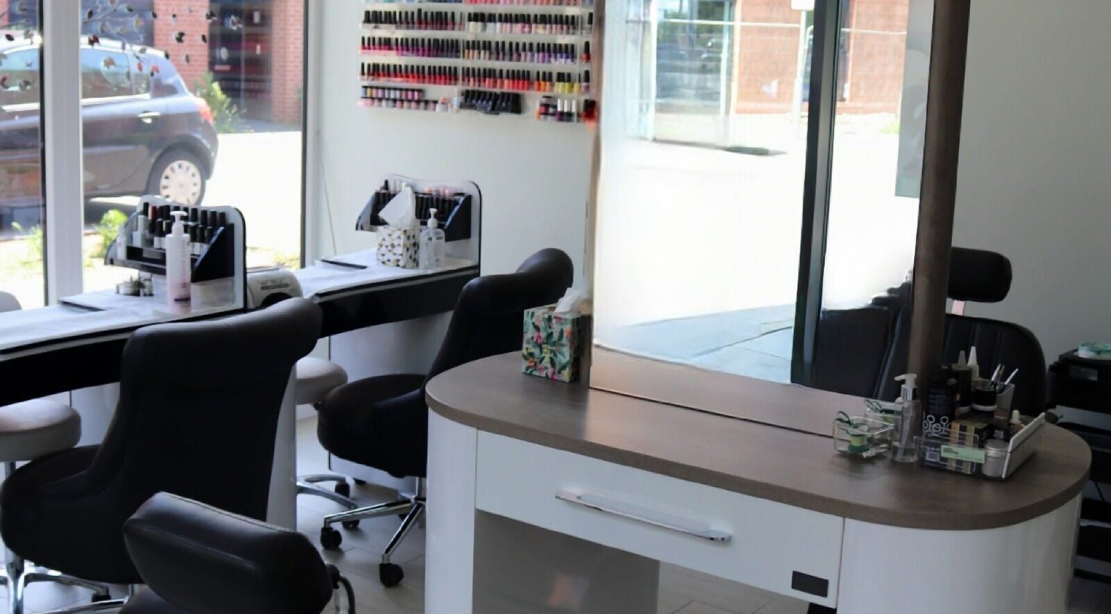 Modern nail station at Grace Nail and Beauty Lounge, Derby, England, GB, showcasing a stylish and inviting setup.