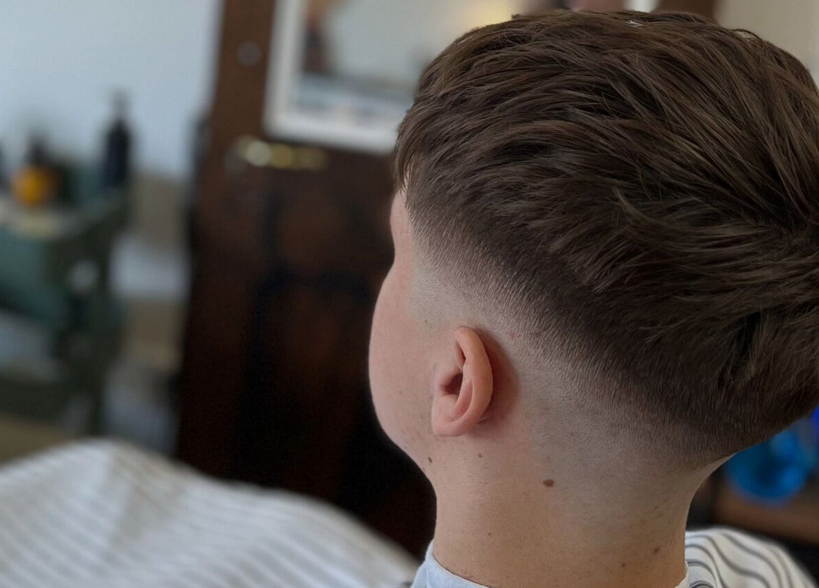 Close-up of sleek fade haircut at Dark and Stormy Barber Collective, Bendigo, Victoria, AU.