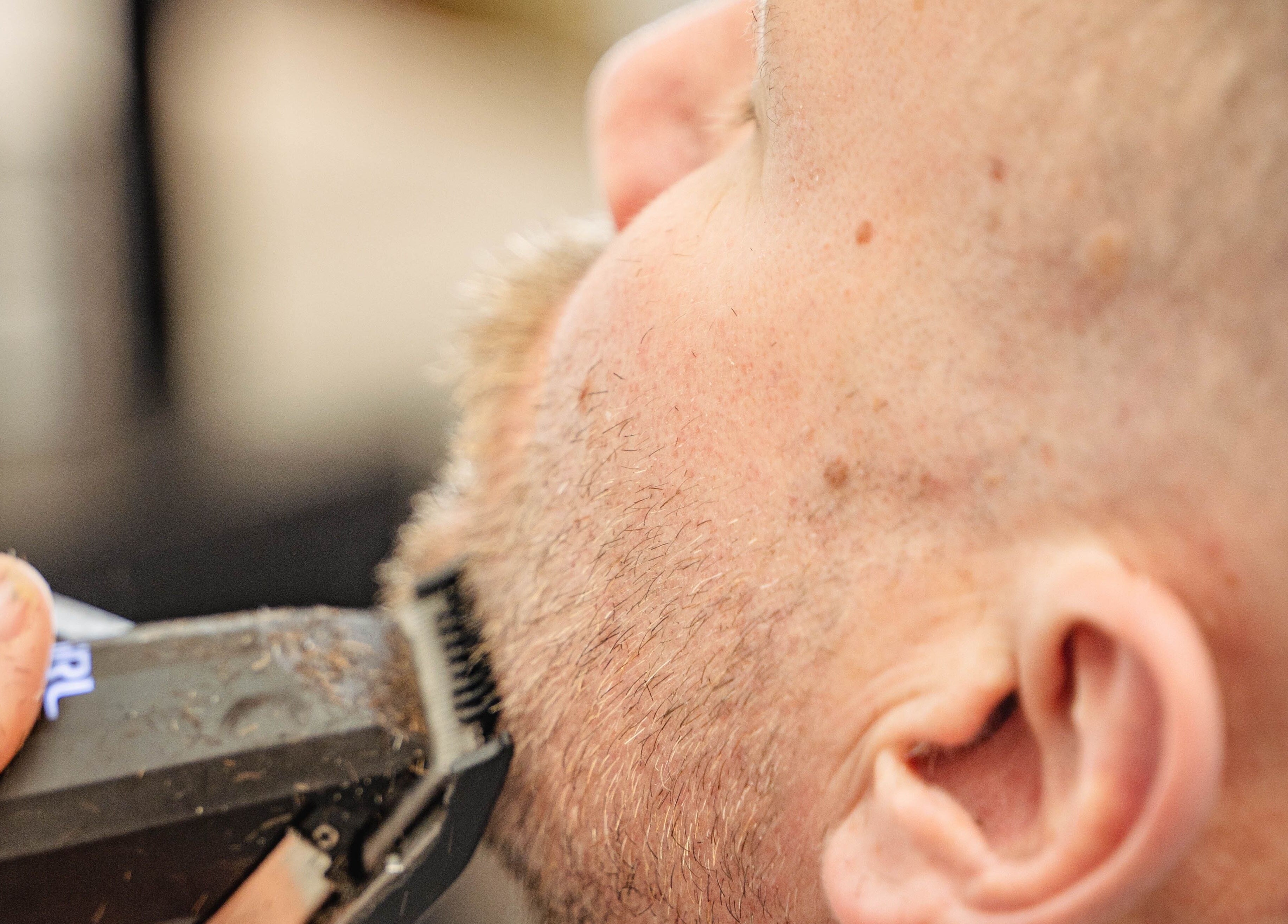 Close-up of precise beard trimming at Dark and Stormy Barber Collective in Bendigo, Victoria, AU.