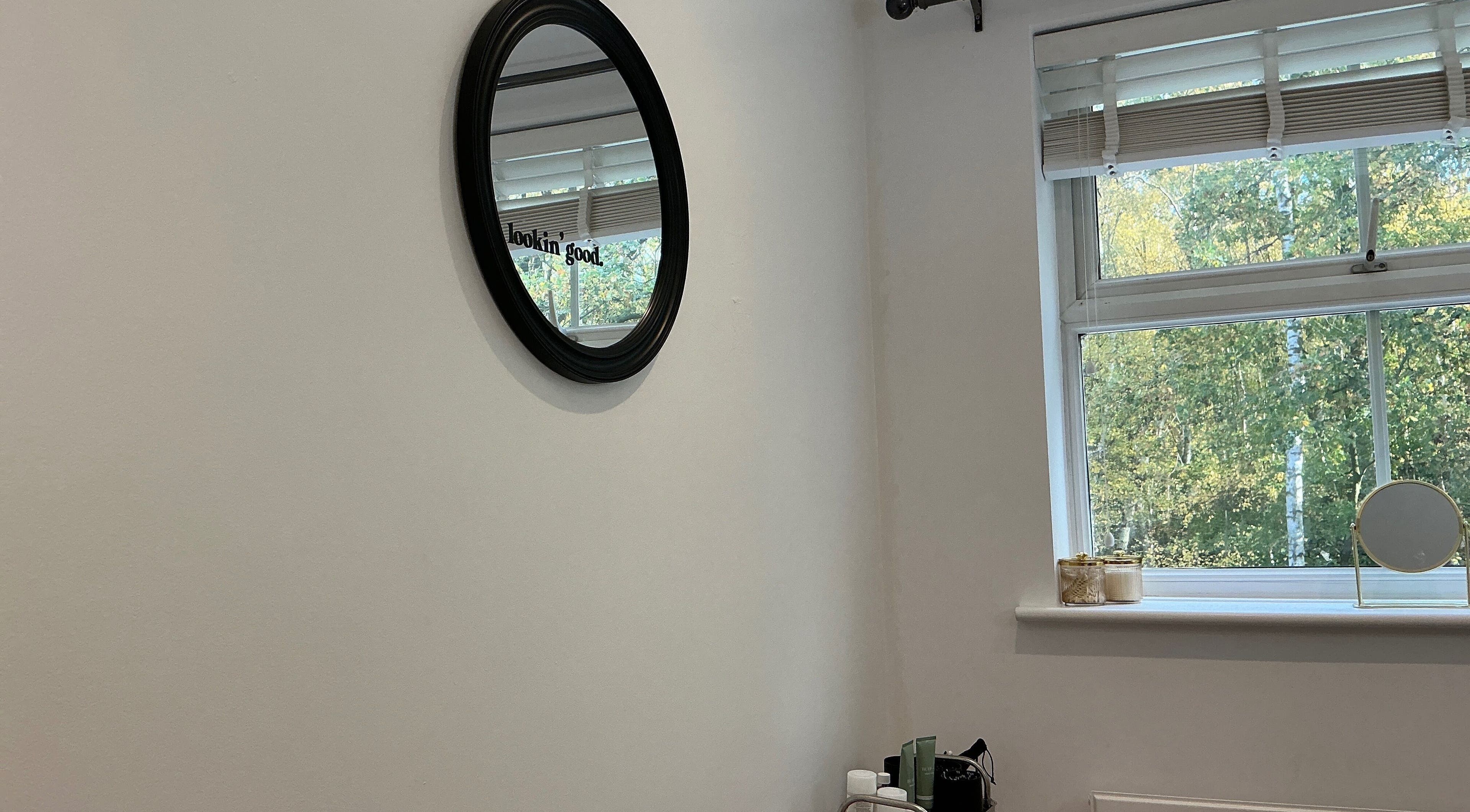 Calm beauty space at Brows by Lauren, Lincoln, England, GB with a wall-mounted mirror and window view.