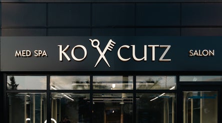 Front view of KO CUTZ SALON & SPA sign in Mississauga, Ontario, CA, showcasing modern elegance.