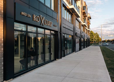 KO CUTZ SALON & SPA exterior in Mississauga, Ontario, CA with modern glass facade.