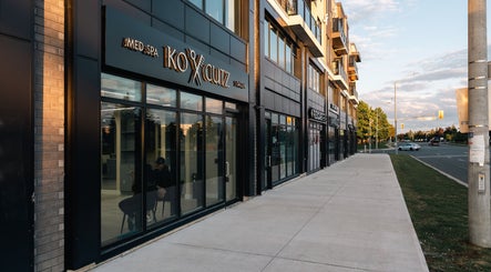 Exterior view of KO CUTZ SALON & SPA in Mississauga, Ontario, CA showcasing modern design along the street.