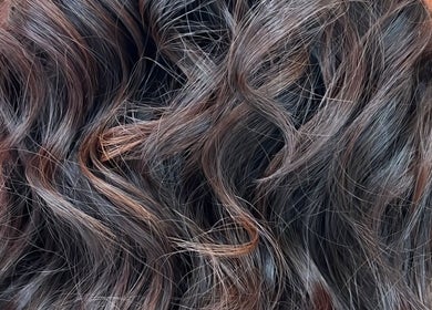 Gorgeous curly hairstyle at KO CUTZ SALON & SPA in Mississauga, Ontario, CA, showcasing professional hair styling.