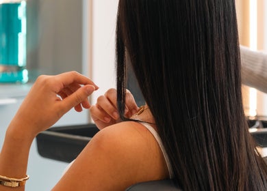 Woman's hair being styled at KO CUTZ SALON & SPA, Mississauga, Ontario, CA.