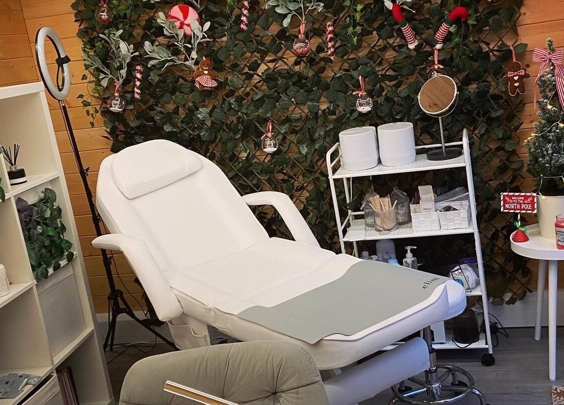 Relaxing spa setup at Nails By Jo in Fremington, England, GB with recliner and lush green decor.