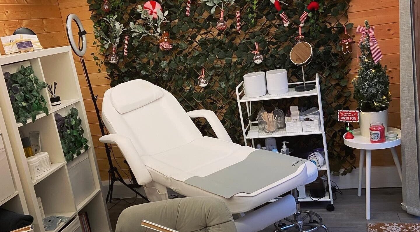 Relaxing spa setup at Nails By Jo in Fremington, England, GB with recliner and lush green decor.