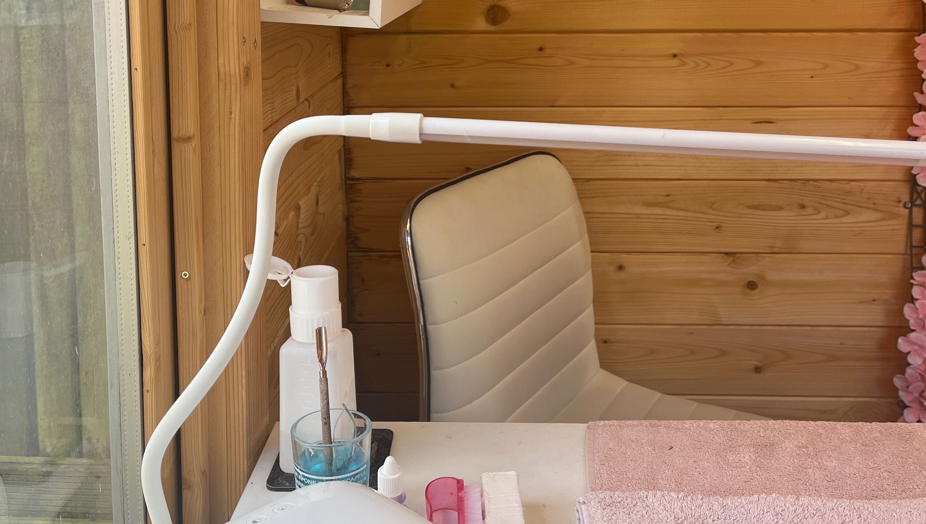 Welcoming nail station at Magpie Nails, Havant, England, GB with comfy chair and organized tools.