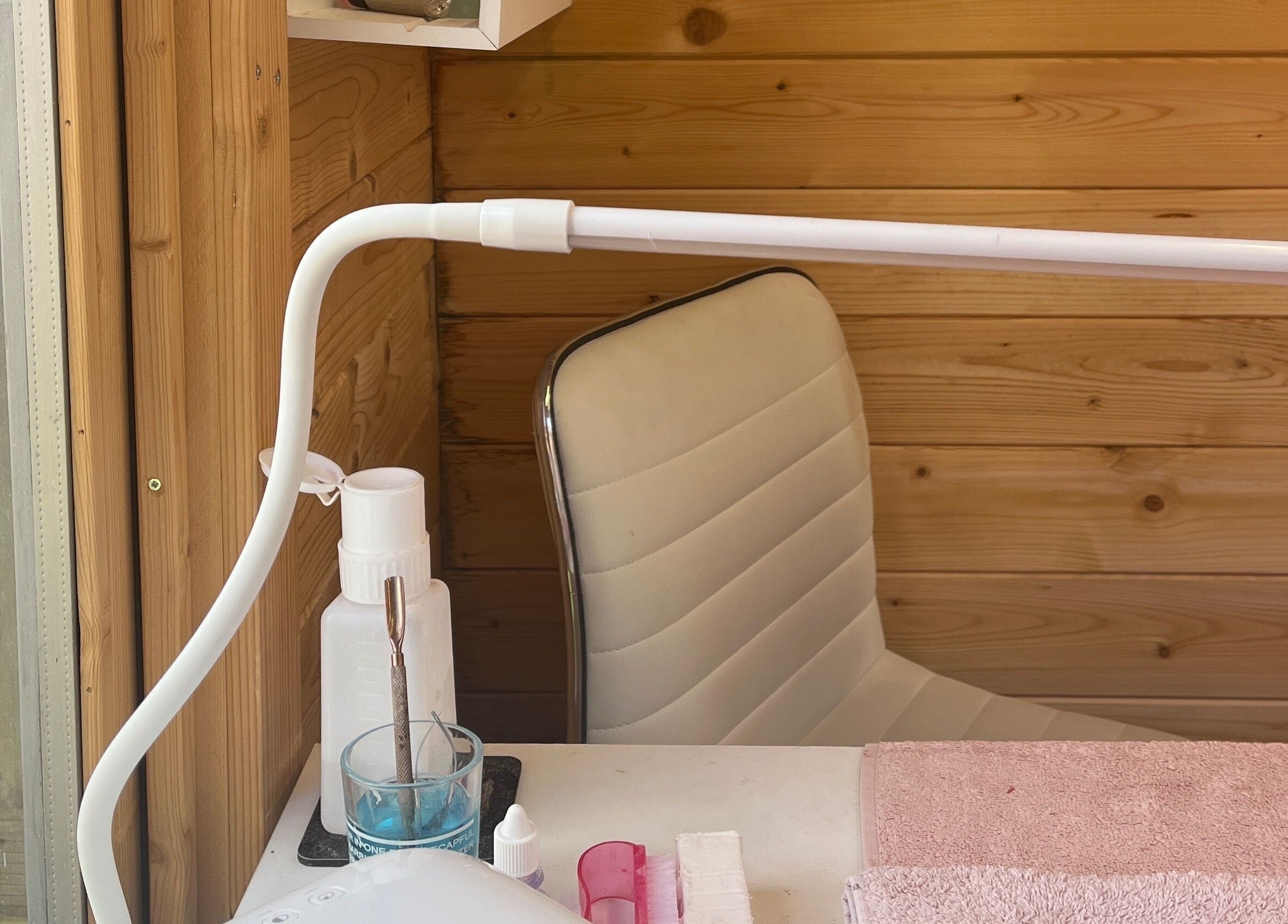 Welcoming nail station at Magpie Nails, Havant, England, GB with comfy chair and organized tools.