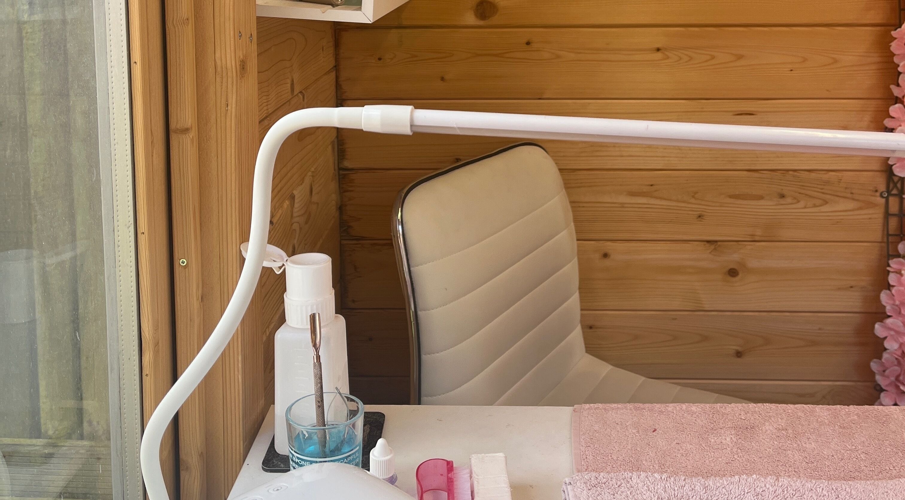 Welcoming nail station at Magpie Nails, Havant, England, GB with comfy chair and organized tools.