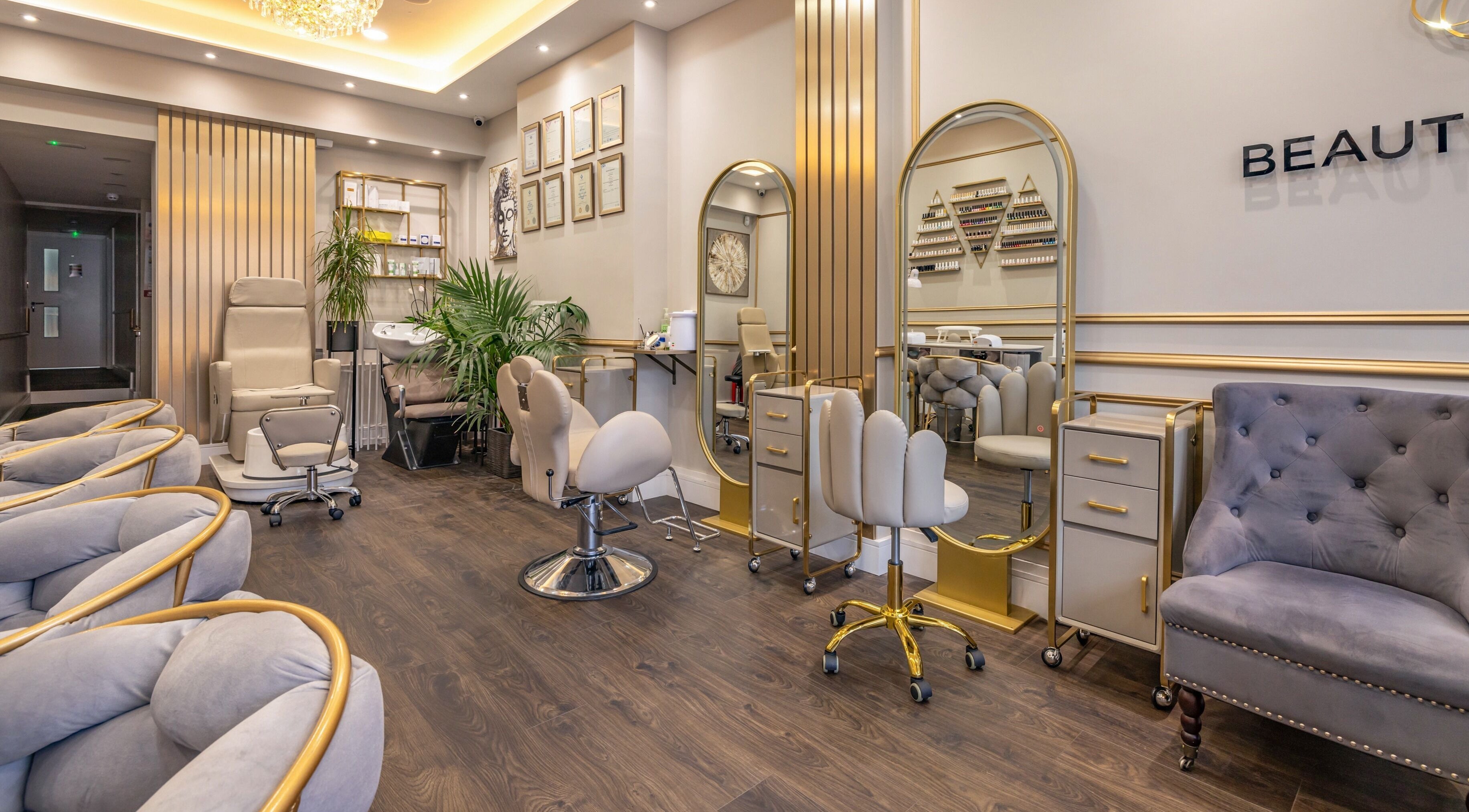 Luxurious interior of Azera Beauty Clinic & Academy in London, England, GB, featuring elegant seating and mirrors.