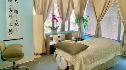 Tranquil therapy room at San Diego Reiki (Mission Valley), San Diego, CA, US, with massage table and serene decor.