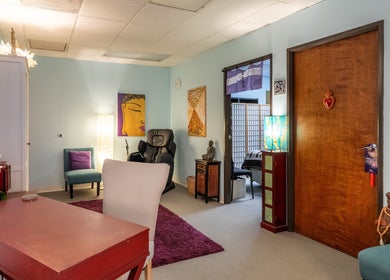 Relaxing therapy room at San Diego Reiki (Mission Valley) in San Diego, CA, US with calming decor and seating.