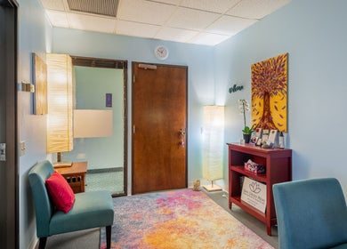 Cozy waiting area at San Diego Reiki (Mission Valley), San Diego, CA, US with vibrant decor and soothing lighting.