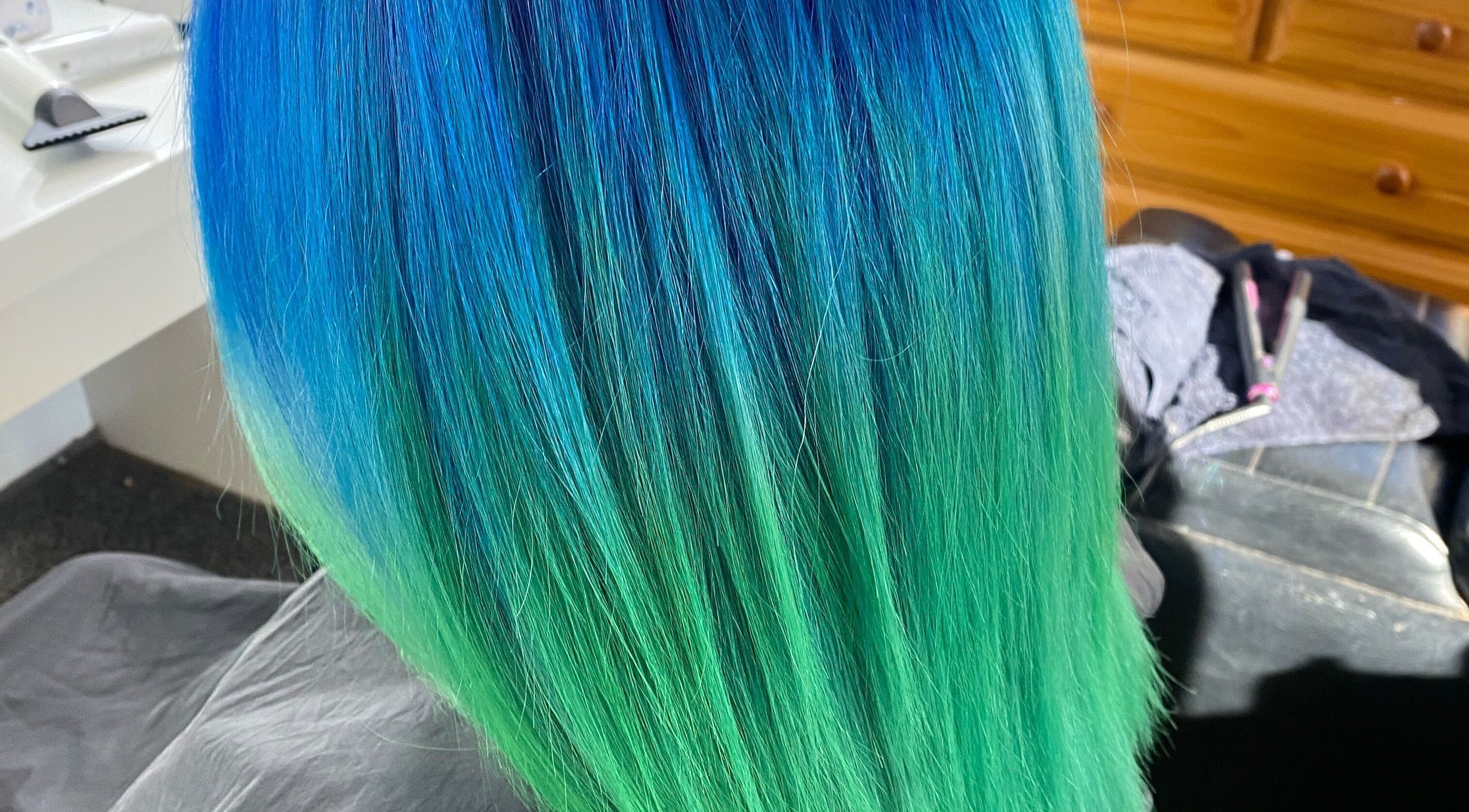 Vibrant blue and green hair at Jax Organic Hair & Makeup, Parmelia, Western Australia, AU.