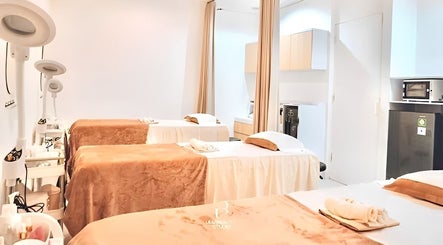 Tranquil treatment room at ULU Beauty Studio, Bali, Bali, ID showcasing elegant spa beds with soft lighting.