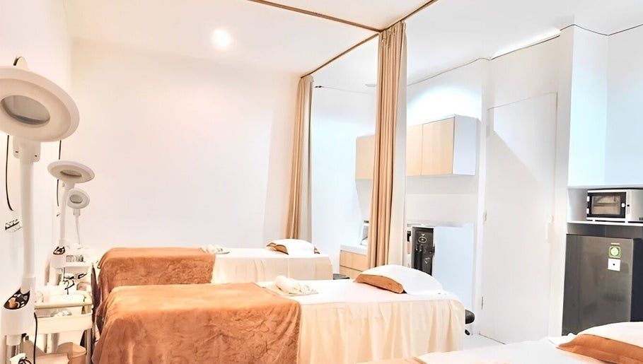Relaxing treatment beds at ULU Beauty Studio in Bali, Bali, ID, offering a tranquil spa experience.