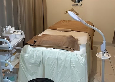 Relaxing treatment room at ULU Beauty Studio, Bali, Bali, ID with a spa bed and calming ambiance.