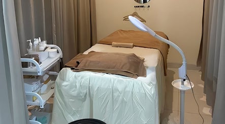 Relaxing treatment room at ULU Beauty Studio, Bali, Bali, ID with a spa bed and calming ambiance.