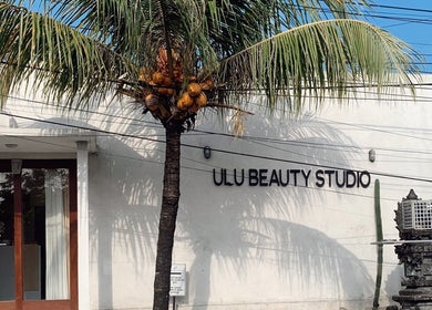 Front entrance of ULU Beauty Studio in Bali, ID featuring tropical decor and serene environment.