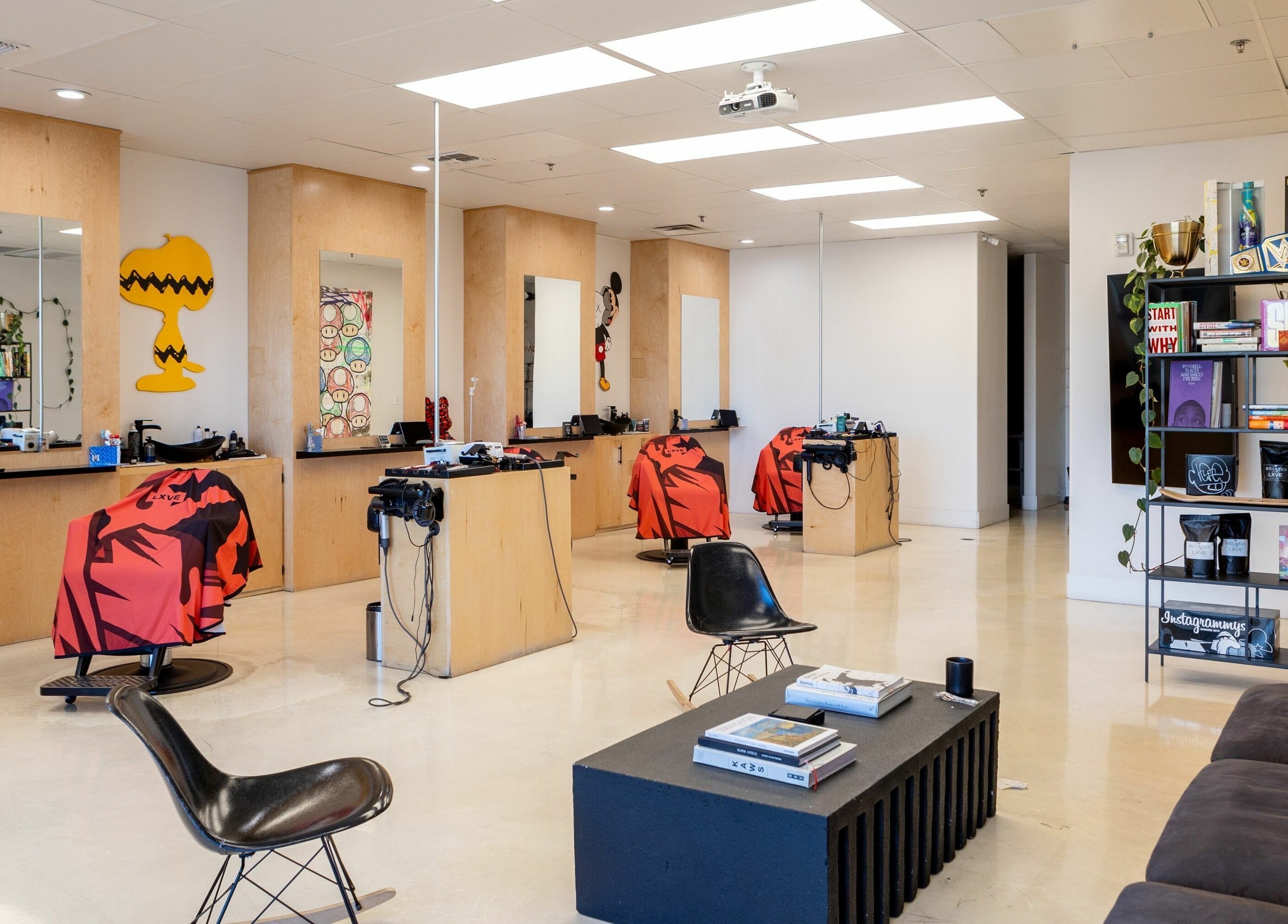 Modern interior of Lxve Studios in Las Vegas, Nevada, US, featuring stylish decor and salon chairs.