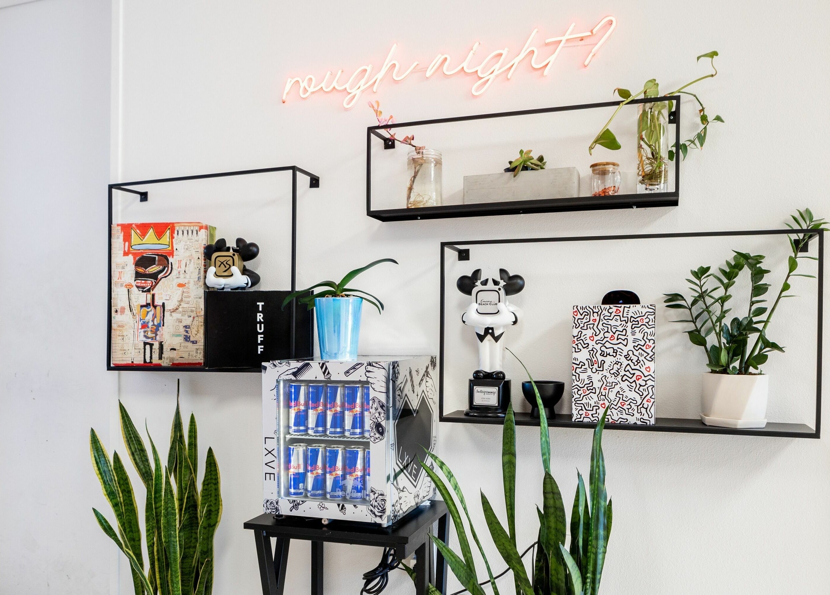 Modern wall decor at Lxve Studios with plants and art in Las Vegas, Nevada, US.