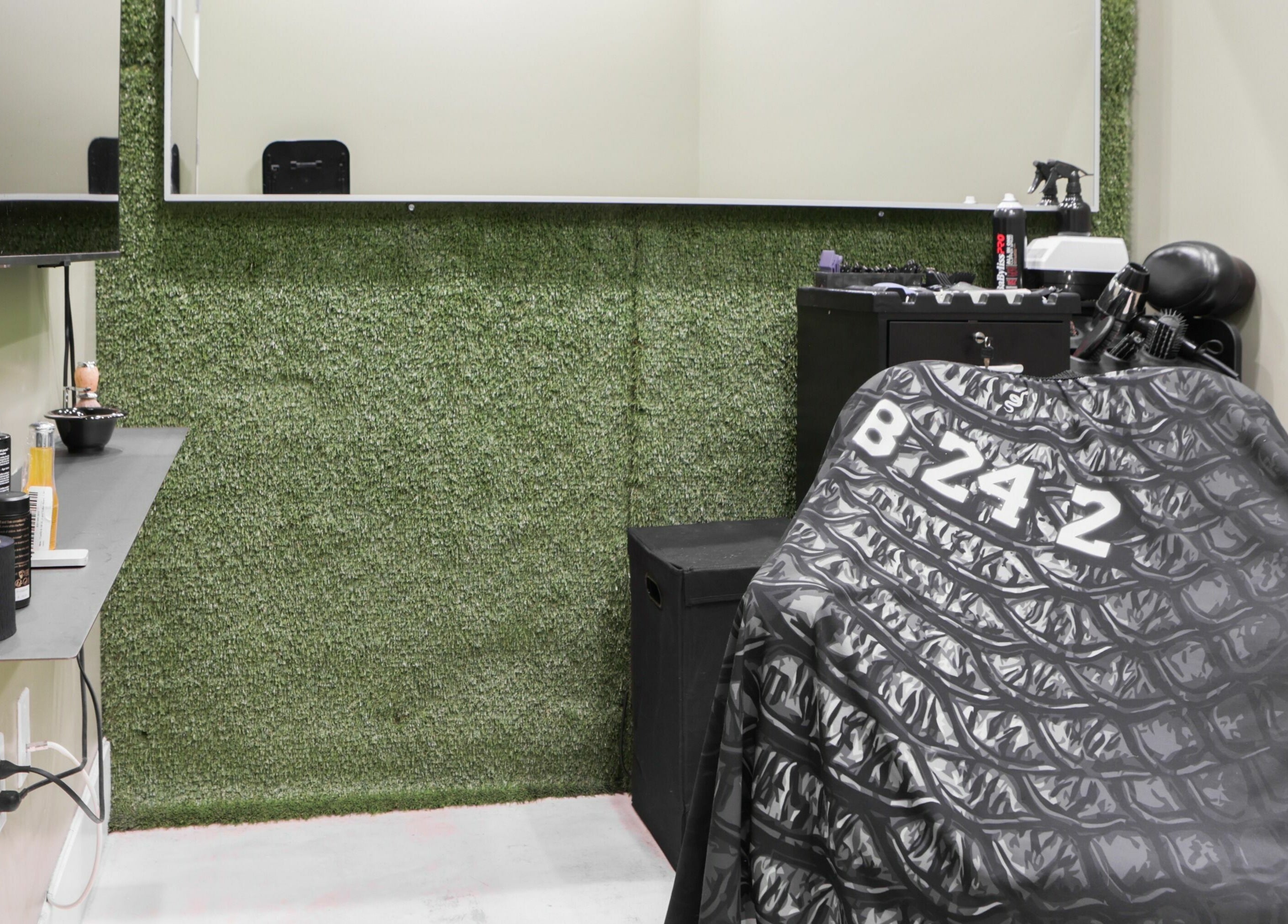 Modern barber station at Lxve Studios in Las Vegas, Nevada, US, featuring stylish decor and professional tools.