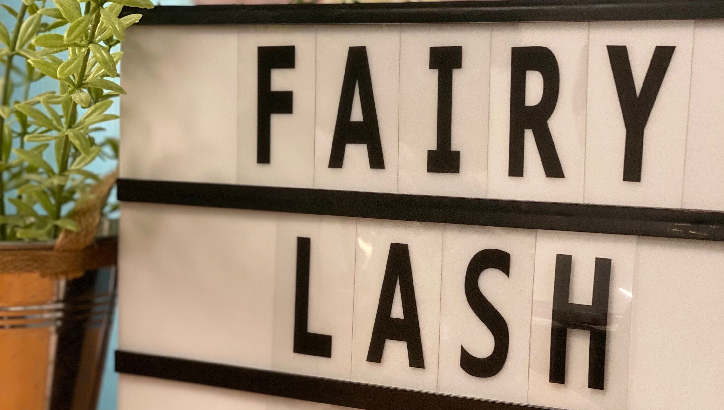 Fairy Lash KL sign with greenery in Kuala Lumpur, Wilayah Persekutuan Kuala Lumpur, MY.