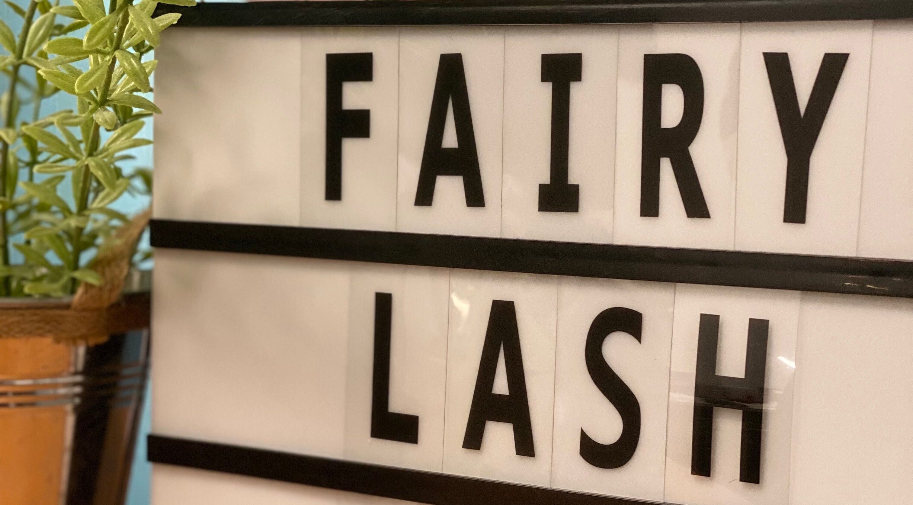 Fairy Lash KL sign with greenery in Kuala Lumpur, Wilayah Persekutuan Kuala Lumpur, MY.