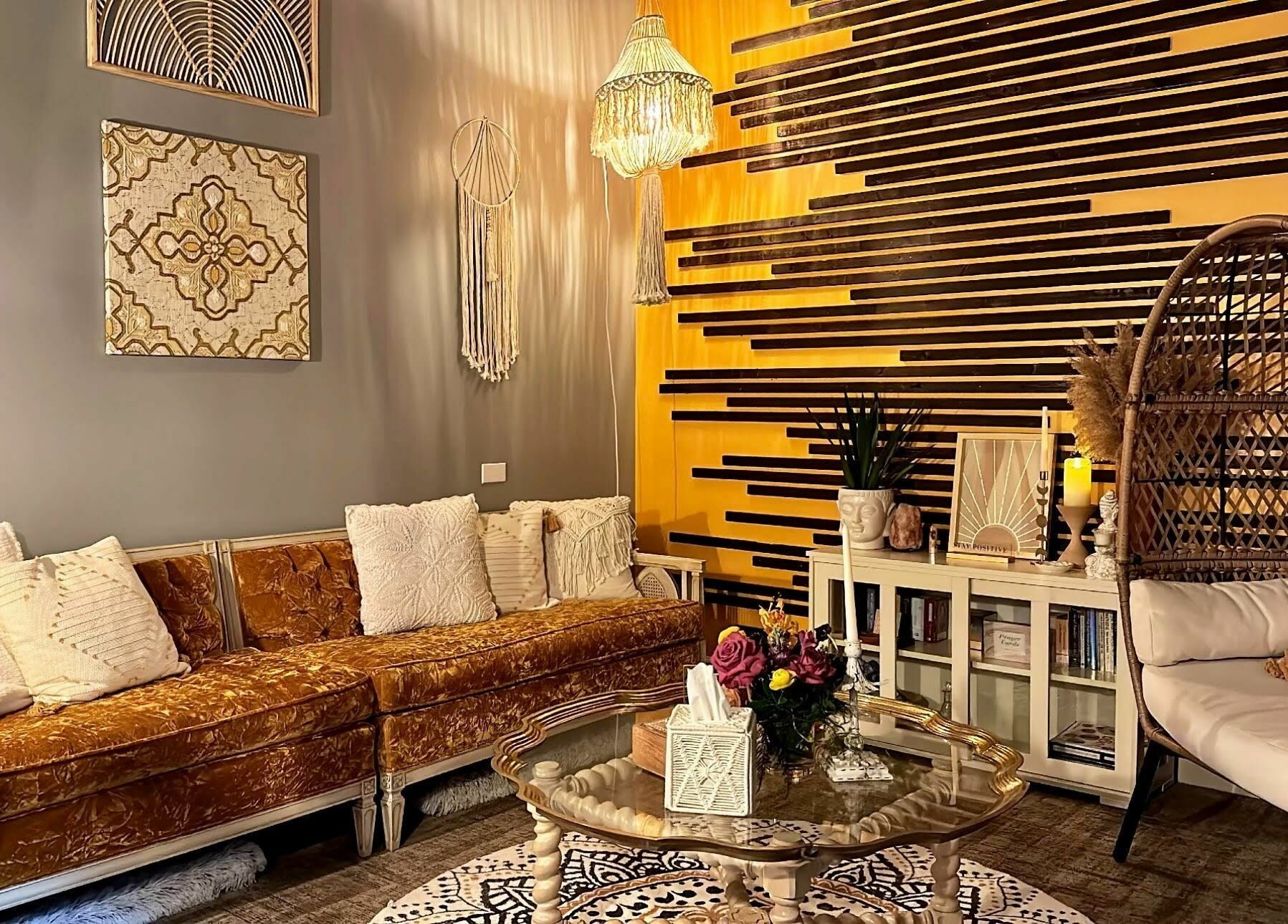 Cozy bohemian-style seating area at Aura Holistic and Metaphysical Wellness in Aurora, Illinois, US.