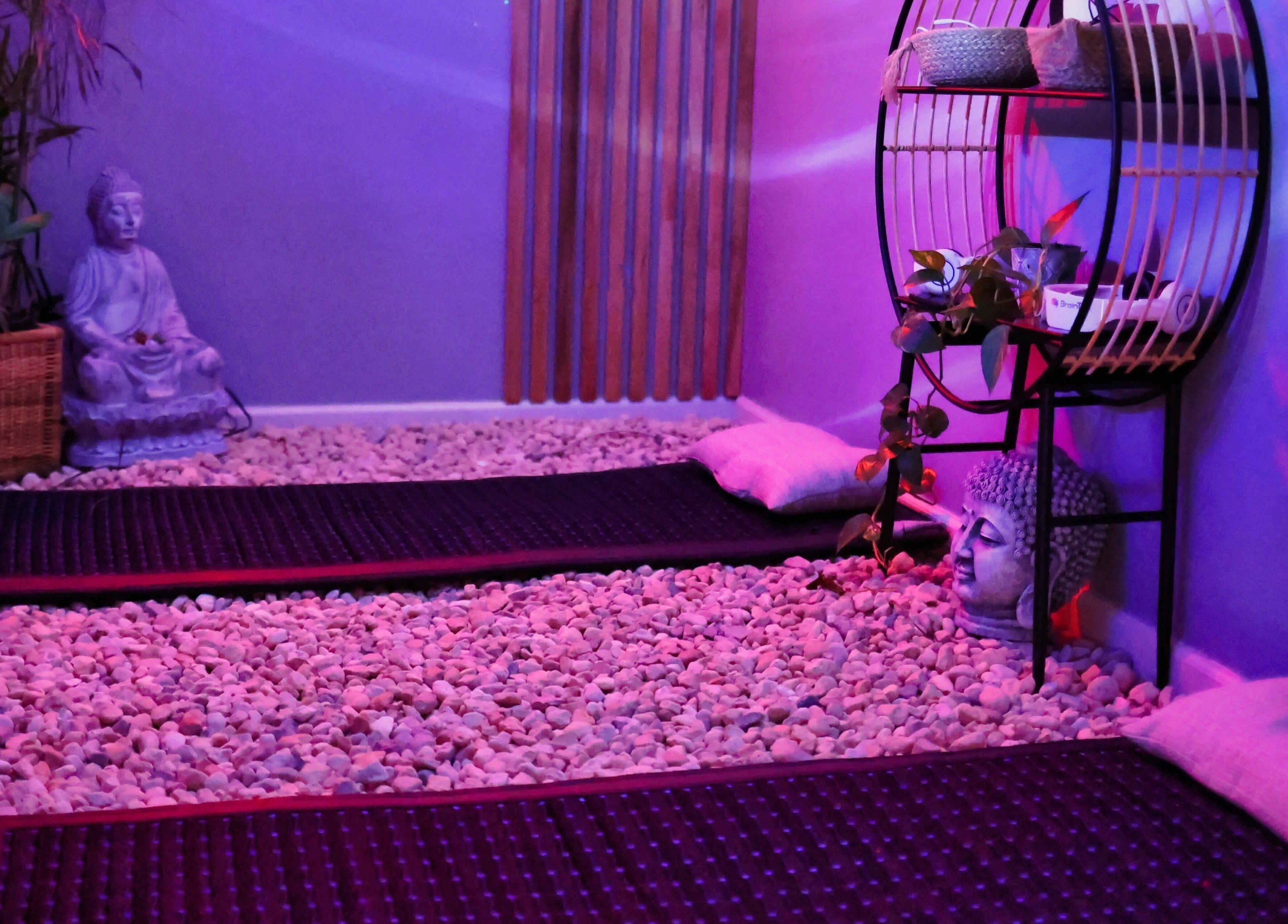 Peaceful meditation room at Aura Holistic and Metaphysical Wellness, Aurora, Illinois, US, with calming decor.