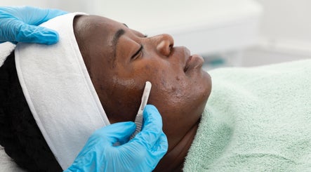 Dermaplaning session at Radiant Skincare and Beauty in Plymouth, England, GB enhancing smooth skin.