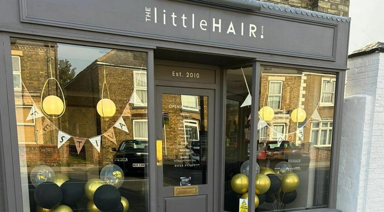 Front view of The Little Hair Shop in Whittlesey, England, GB with elegant decor and welcoming signage.
