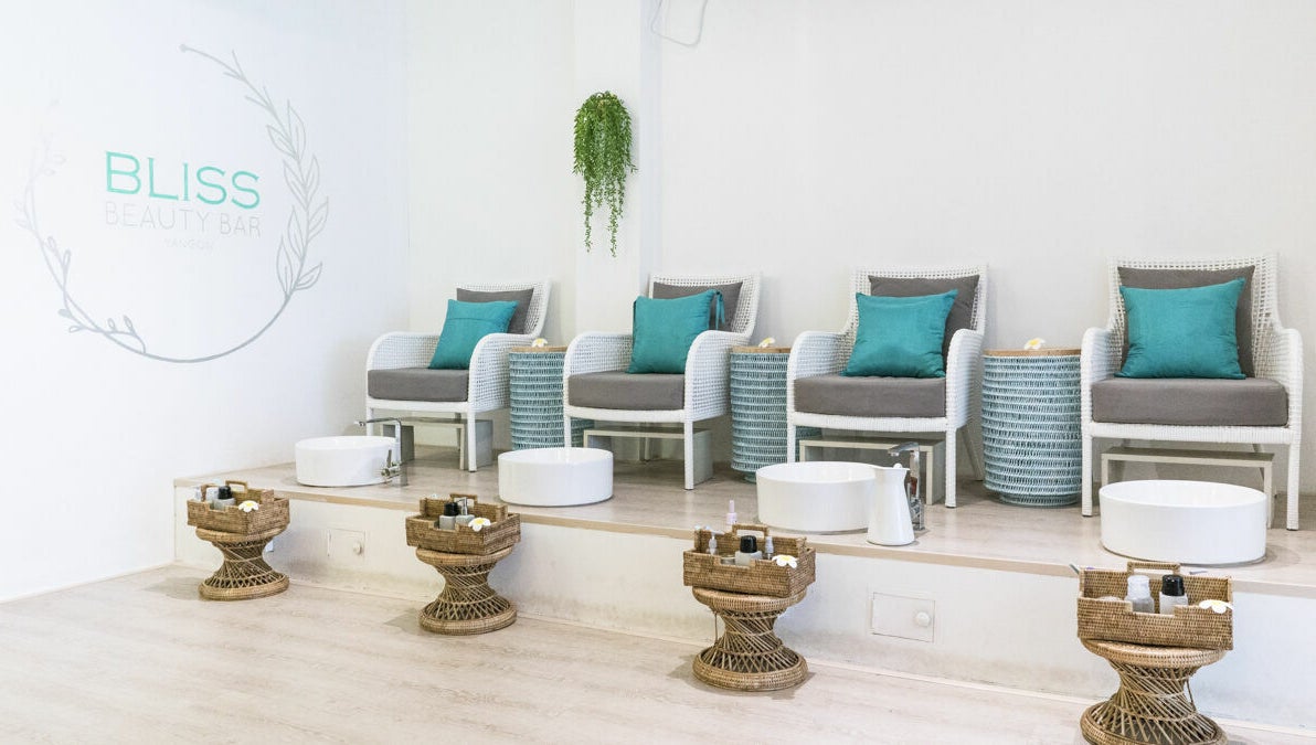 Relaxing pedicure station at Bliss Bar Yangon in Yangon, Yangon Region, MM, featuring elegant seating.