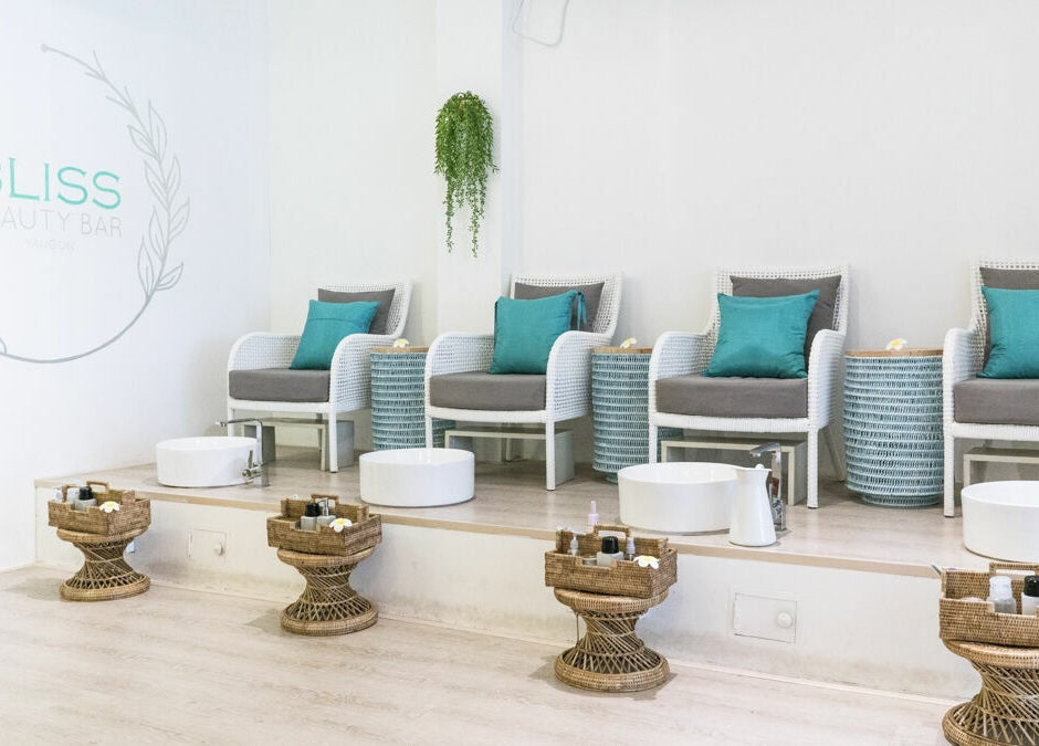 Relaxing pedicure station at Bliss Bar Yangon in Yangon, Yangon Region, MM, featuring elegant seating.