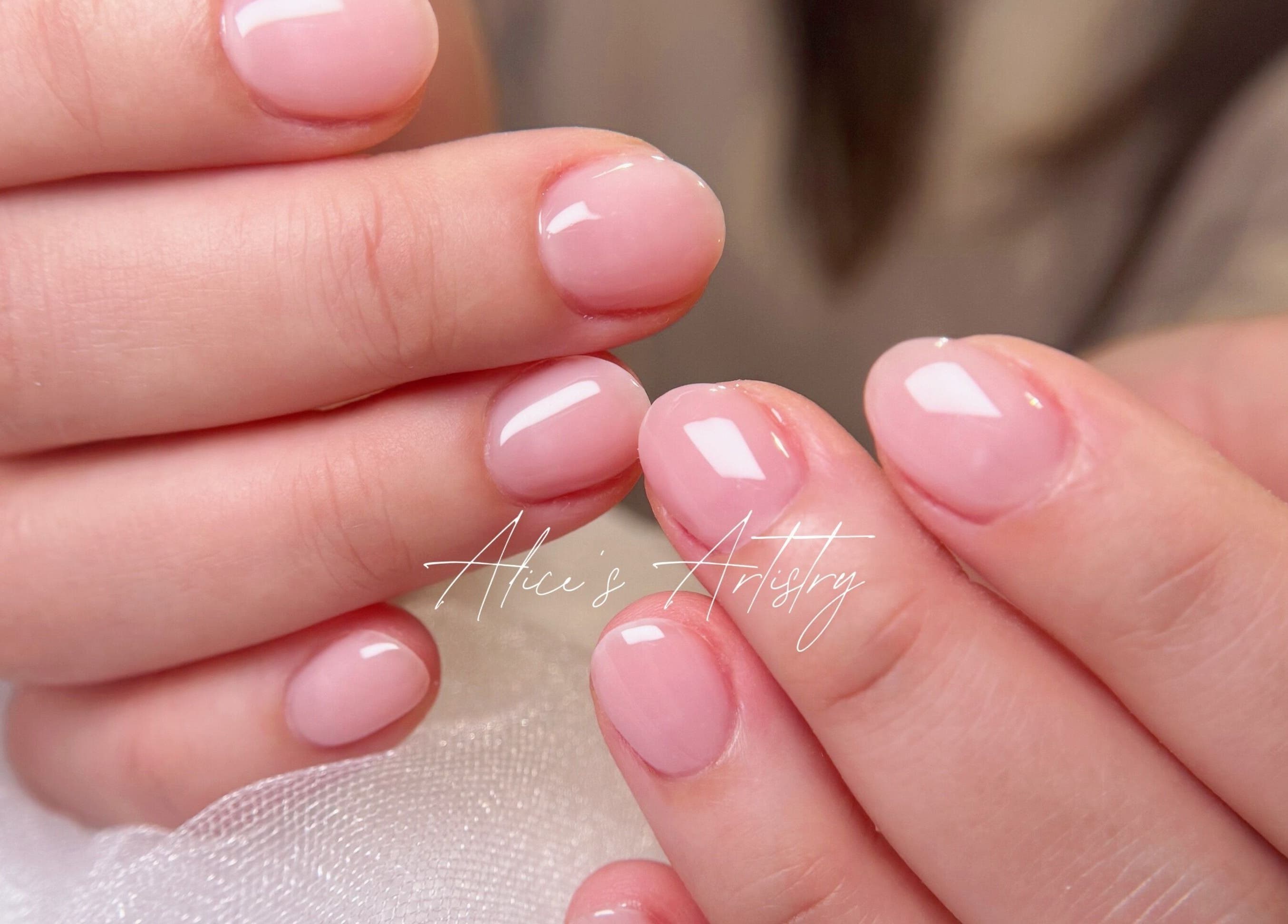 Close-up of elegant pink manicure at Navi&Co Beauty Studio, New Westminster, British Columbia, CA.