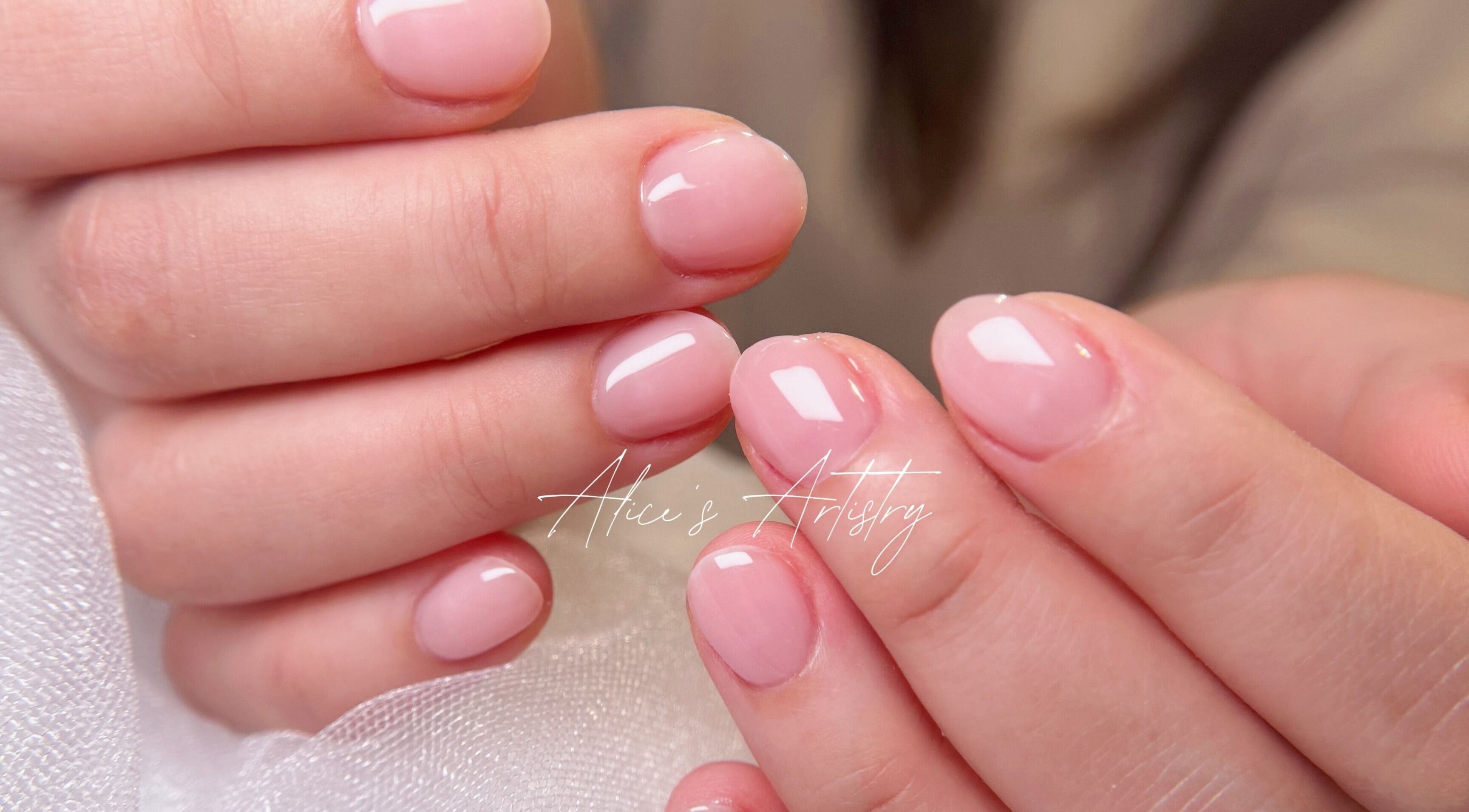 Close-up of elegant pink manicure at Navi&Co Beauty Studio, New Westminster, British Columbia, CA.
