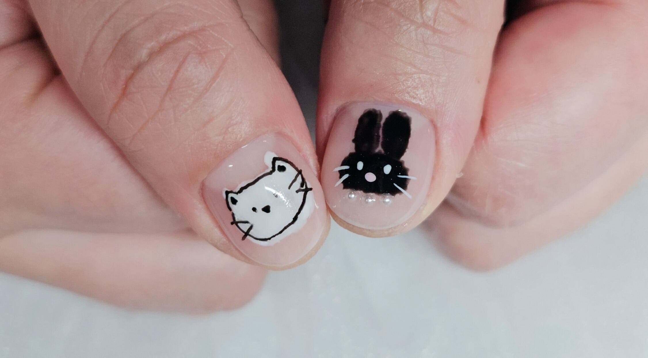 Adorable cat and bunny nail art at Navi&Co Beauty Studio, New Westminster, British Columbia, CA.