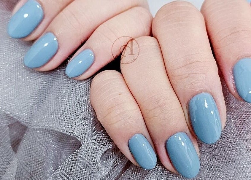 Elegant blue manicure at Navi&Co Beauty Studio, New Westminster, British Columbia, CA.