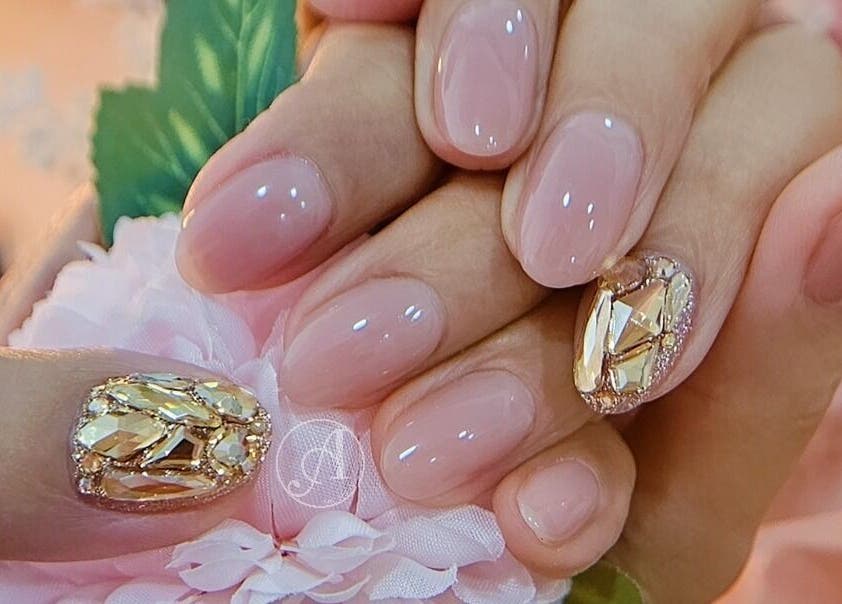 Close-up of elegant nail art with gems at Navi&Co Beauty Studio, New Westminster, British Columbia, CA.