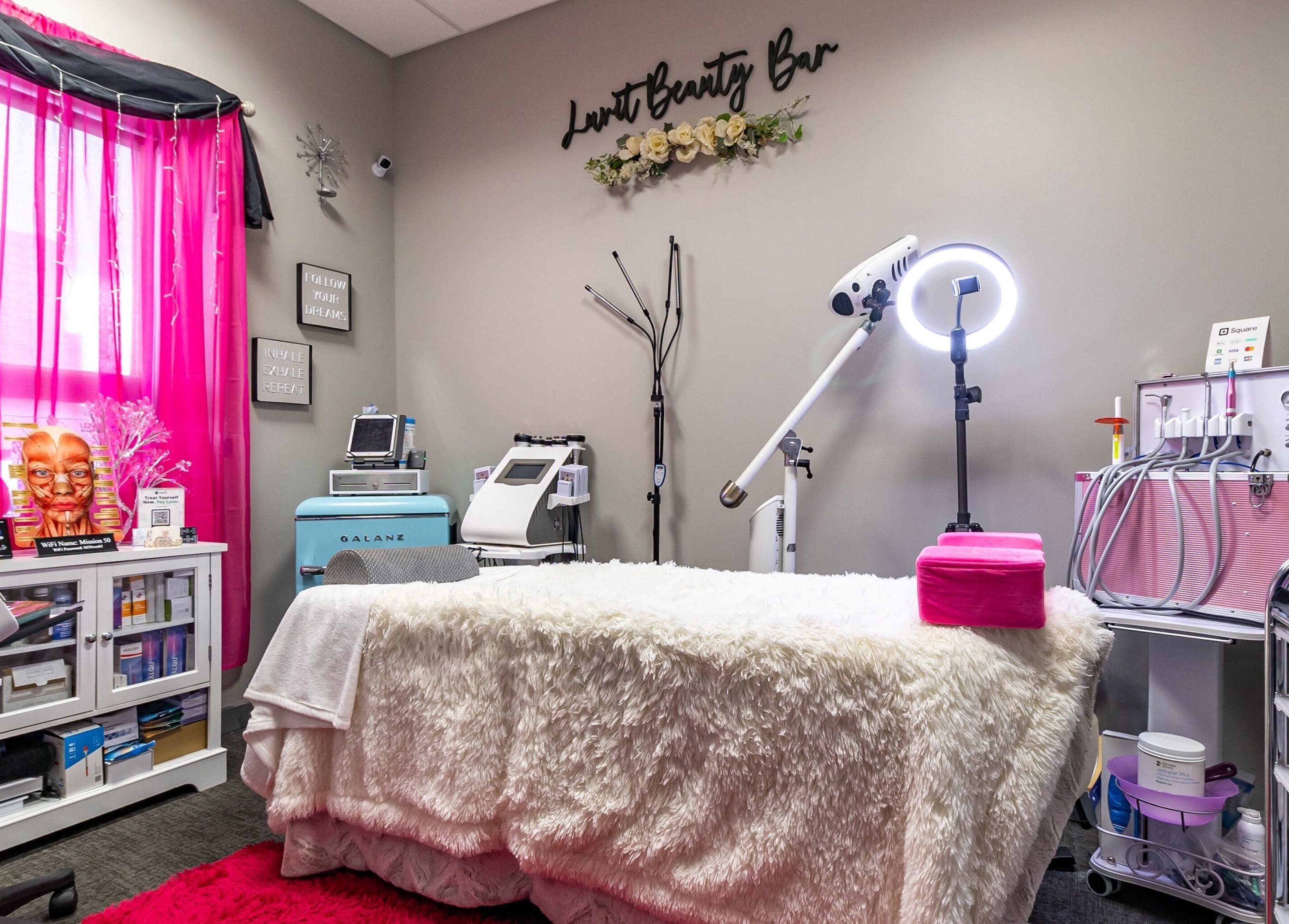 Cozy treatment room at Luvit Beauty Bar, Hoboken, New Jersey, US, with modern equipment and decor.