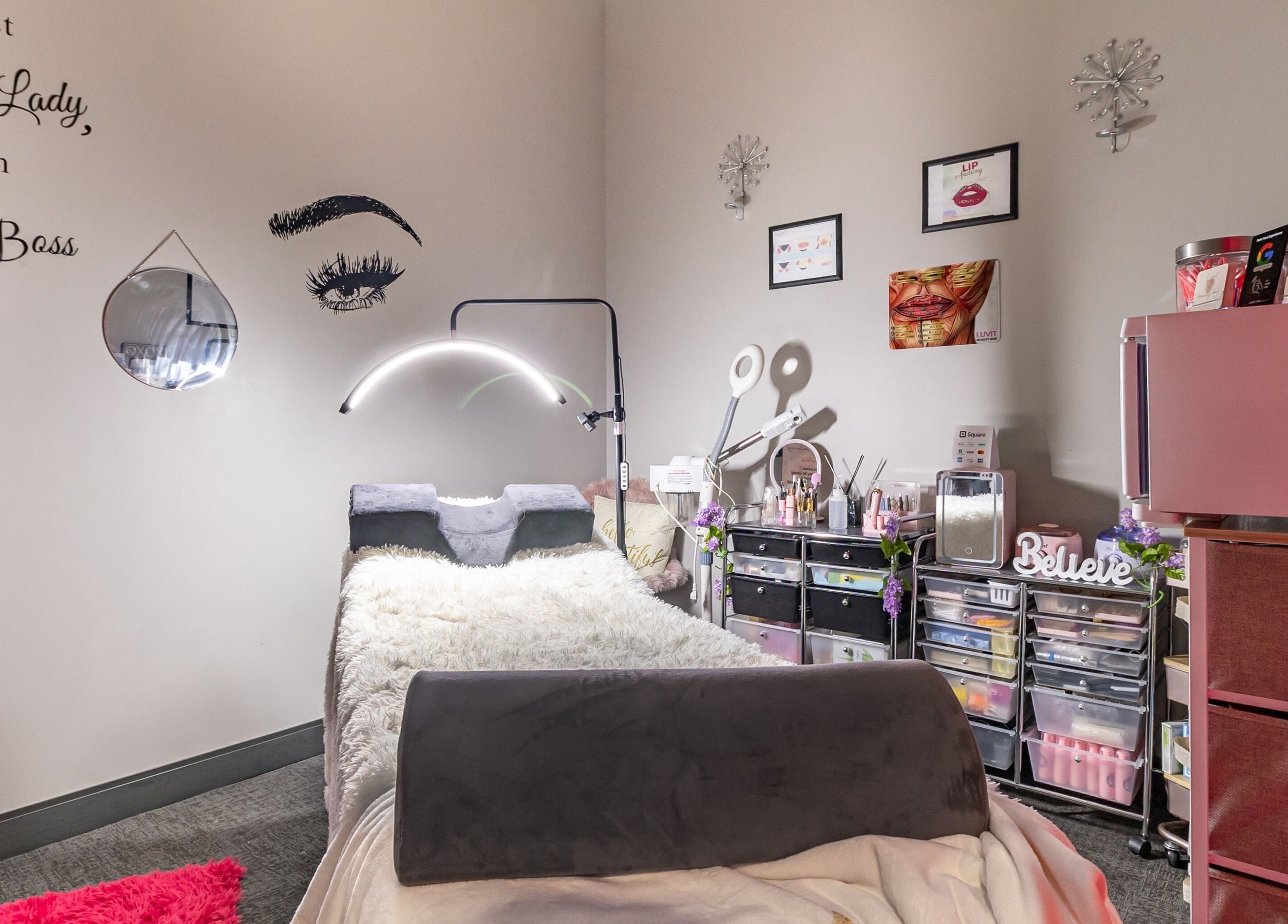 Cozy lash room at Luvit Beauty Bar in Hoboken, New Jersey, US with plush bed and elegant decor.