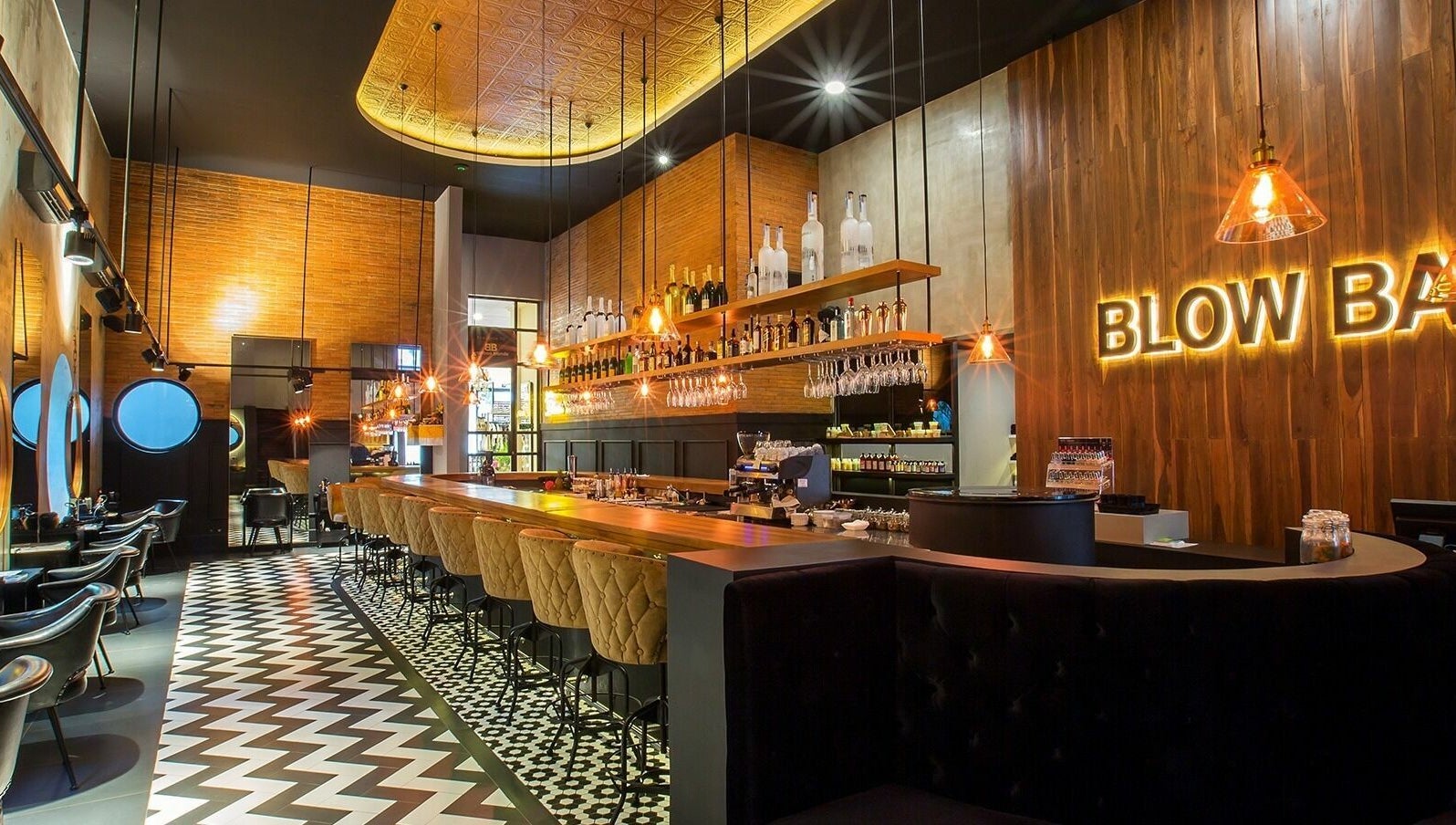 Sophisticated interior view of Blow Bar Bali with plush seating and stylish lighting in Bali, Bali, ID.