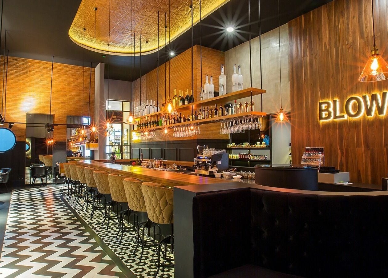 Sophisticated interior view of Blow Bar Bali with plush seating and stylish lighting in Bali, Bali, ID.