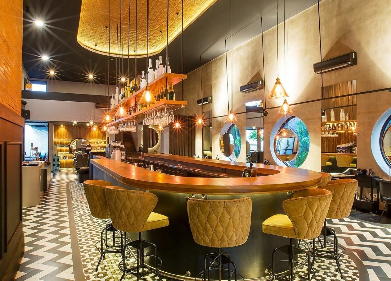 Elegant interior of Blow Bar Bali with stylish lighting and seating in Bali, Bali, ID.