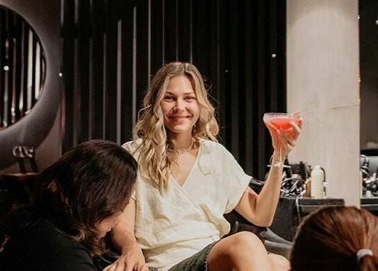 Enjoy a stylish moment at Blow Bar Bali, Bali, ID, with chic ambiance and cocktails.