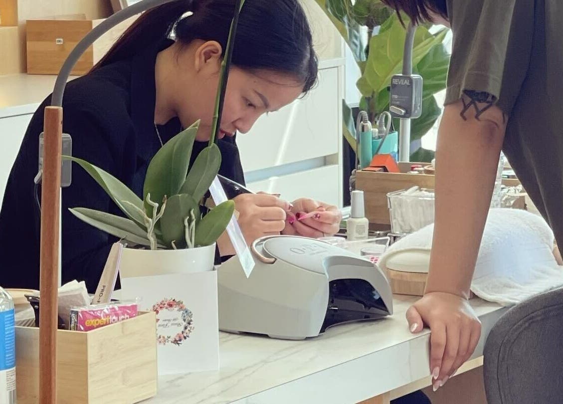 Nail technician providing a manicure at Diamond Day Spa in Lower Hutt, Wellington, NZ.