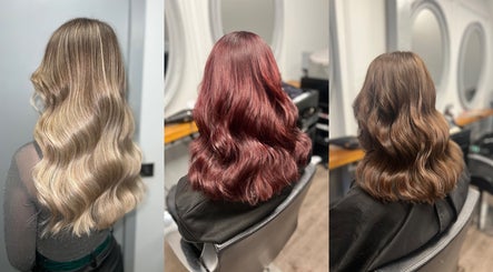 Elegant wavy hairstyles crafted at Hair by Hannah Milne, Aberdeen, Scotland, GB, showcasing diverse hair colors.