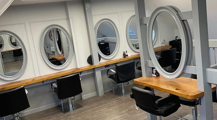 Elegant styling chairs and mirrors at Hair by Hannah Milne in Aberdeen, Scotland, GB.